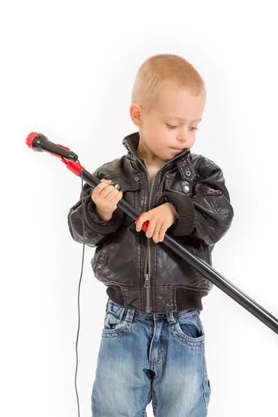 Mały chłopiec rocker ze statywem mikrofonu — Zdjęcie stockowe