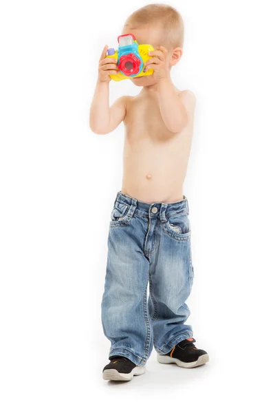 Young half naked boy is taking a photo — Stock Photo, Image