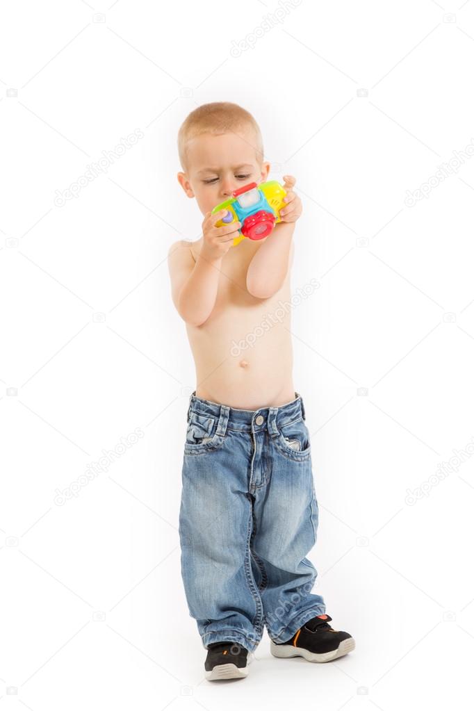 Young half naked boy is taking a photo