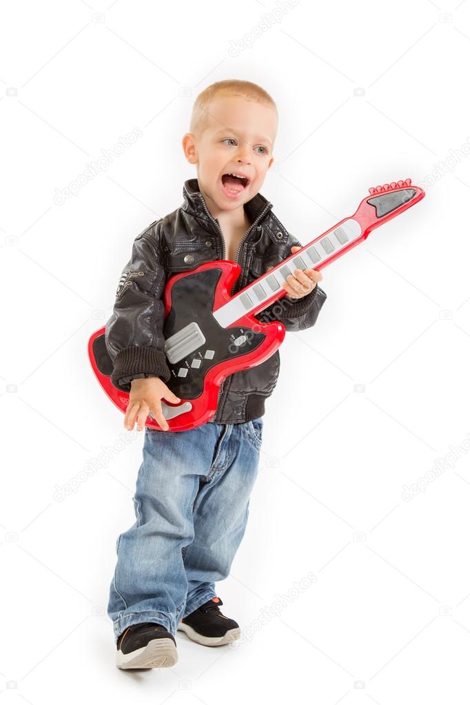 Little rocker boy with his guitar