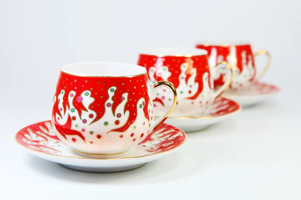 Three beautiful decorated china cups — Stock Photo, Image