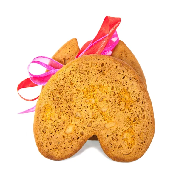Isolated gingerbread cookie back with pink bow — Stock Photo, Image