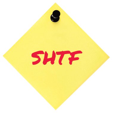 Shit Hits The Fan initialism SHTF red marker written text preppers notice, societal collapse preparedness concept, isolated yellow post-it to-do list sticky note adhesive reminder sticker black pushpin thumbtack macro closeup mankind doomsday crisis