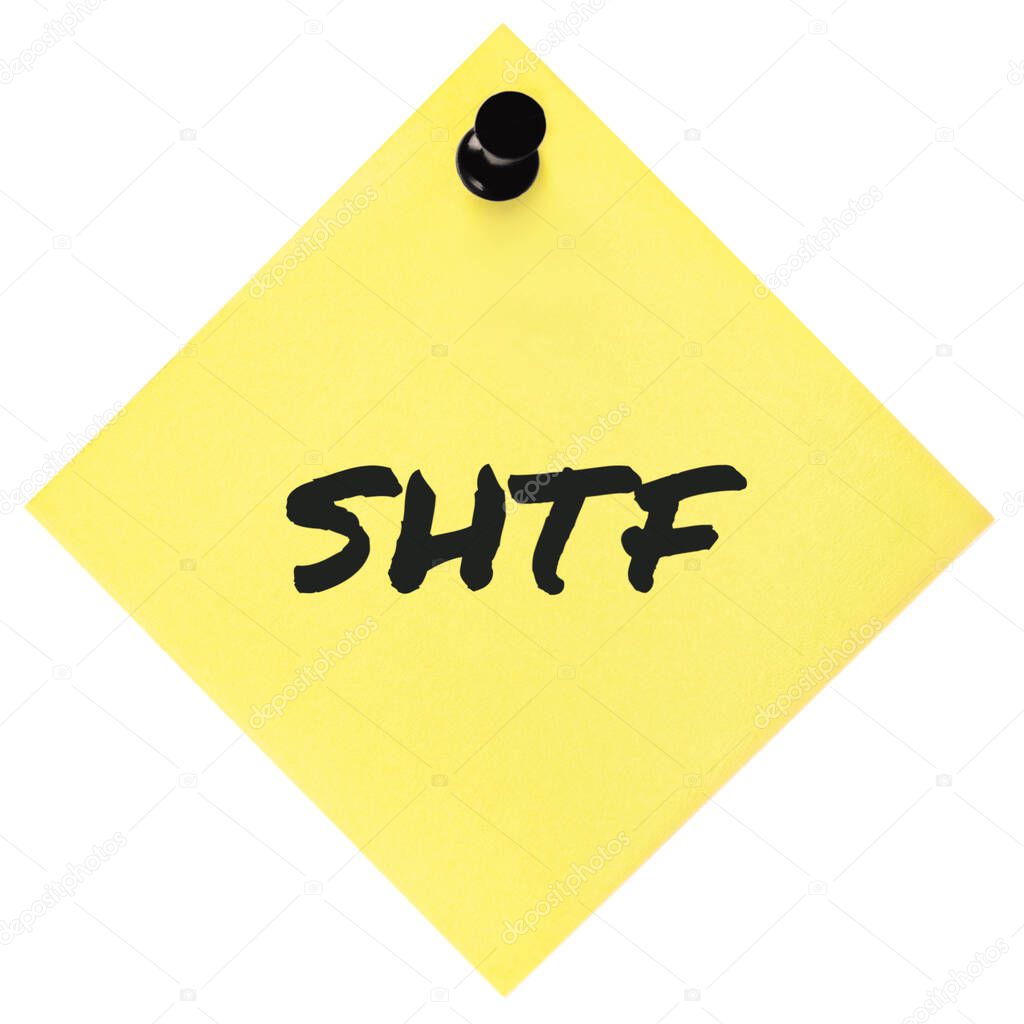 Shit Hits The Fan initialism SHTF black marker written text preppers notice, societal collapse preparedness concept, isolated yellow post-it to-do list sticky note adhesive reminder sticker pushpin thumbtack macro closeup mankind doomsday crisis