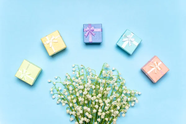 Bouques Fresh Lilies Valley Flowers Pastel Colored Gift Boxes Blue — Fotografia de Stock