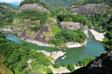 Photo of bamboo rafts drifting in rivers in Wuyi Mountain, Fujian Province, China