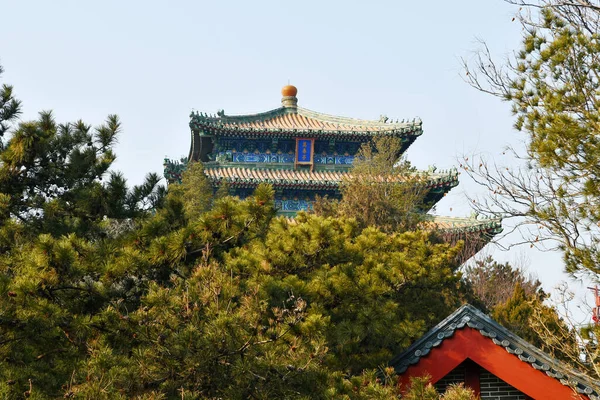 Ancient pavilion on Jingshan Mountain in Beijing, China, with the name of the pavilion  Wan Shou Pavillion  on the plaque