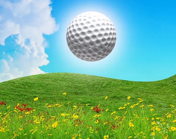 Golf ball in the air on a sunny day — Stock Photo, Image