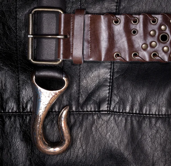 Närbild av ett läder med ett bälte — Stock fotografie