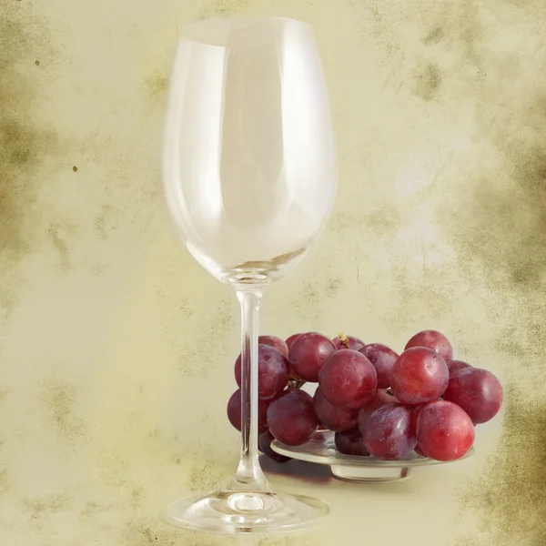 Glass and grapes - picture in retro style — Stock Photo, Image