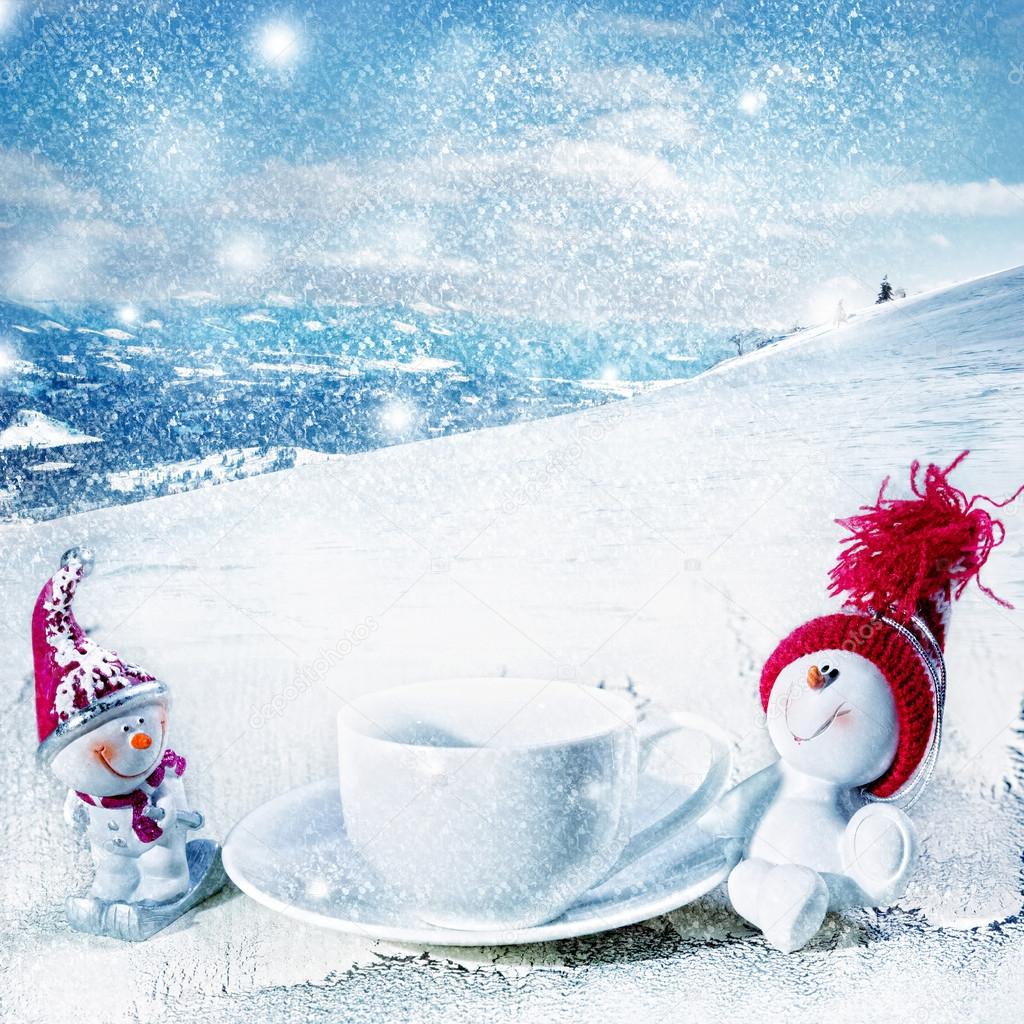 Snowman drinking coffee