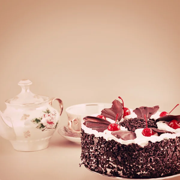 Chocolate cake with cherry topping — Stock Photo, Image