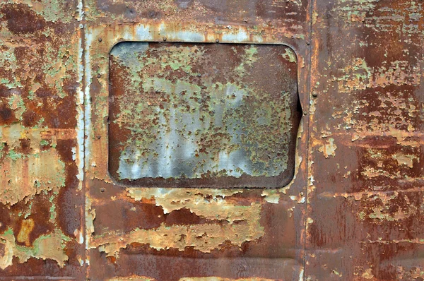 Rusty metal with window — Stock Photo, Image