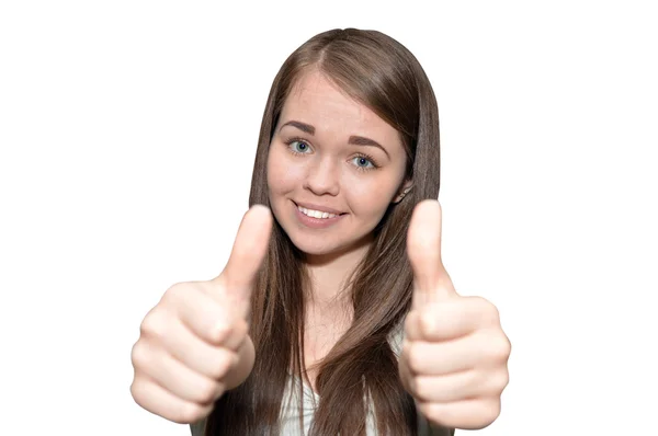 Young woman showing thumbs up Stock Photo