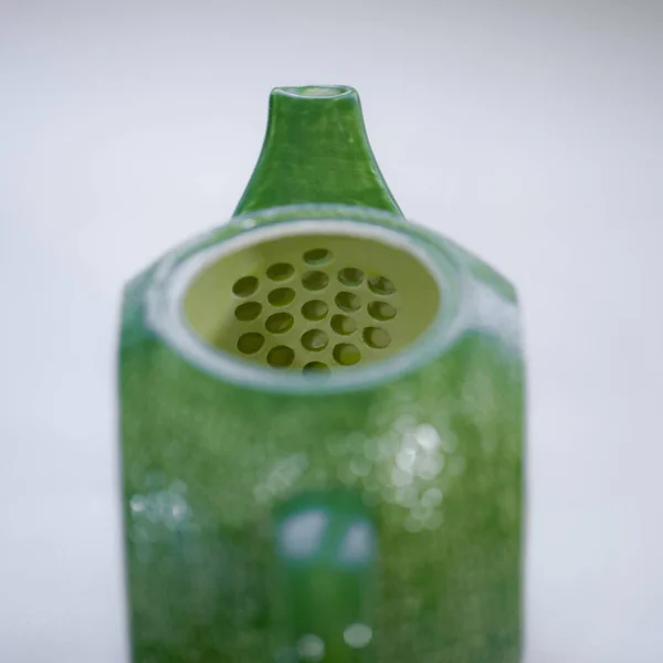 Teapot lime green. Handmade ceramic tea set — стоковое фото