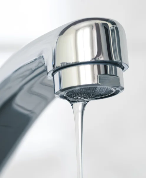 Water flowing from water faucet, close up — Stock Photo, Image