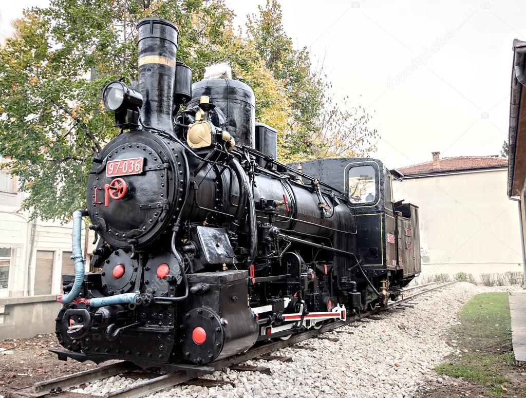 vintage retro historical locomotive train at railroad