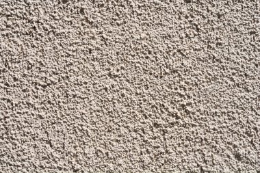 Beyaz boyalı kaba bir duvarın ayrıntıları