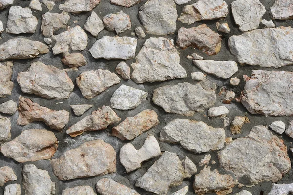 Λεπτομέρεια Ακατέργαστης Πέτρας Και Τσιμεντένιου Τοίχου — Φωτογραφία Αρχείου