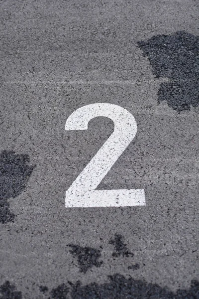 Close Parking Spot White Number Two — Stock Photo, Image