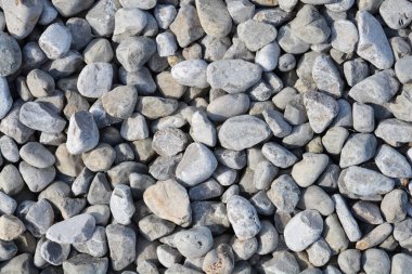 Detail of a ground covered with gray pebbles