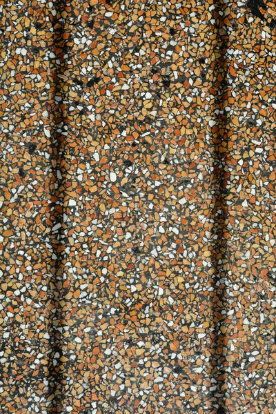 Detail of polished concrete white, brown and black floor