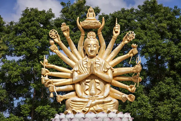 Golden buddha with many arms — Stock Photo, Image