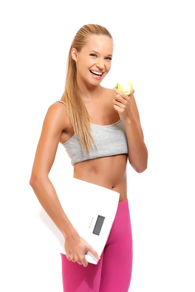Portrait of a sporty woman with apple — Stock Image Portrait of a sporty woman with apple Royalty Free Stock Images