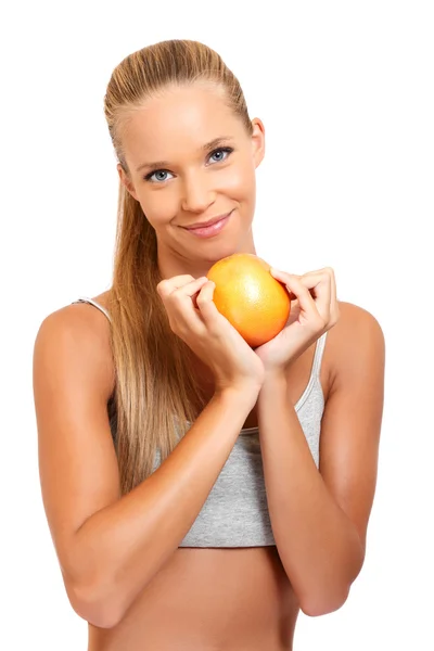Portrait of a healthy woman with an orange — Stock Photo, Image