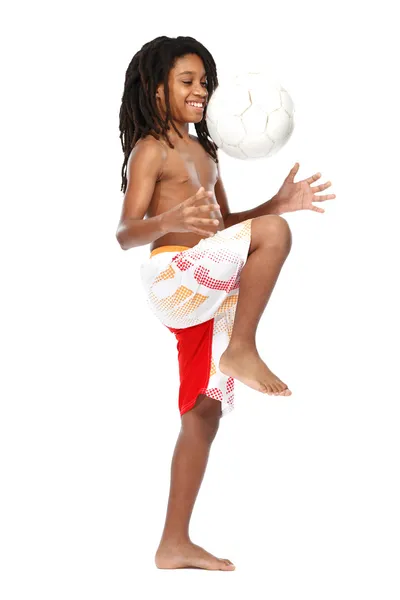 Young rasta guy with football in studio — Stock Photo, Image