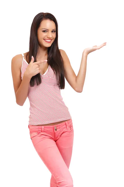 Nice young brunette woman holding something — Stock Photo, Image