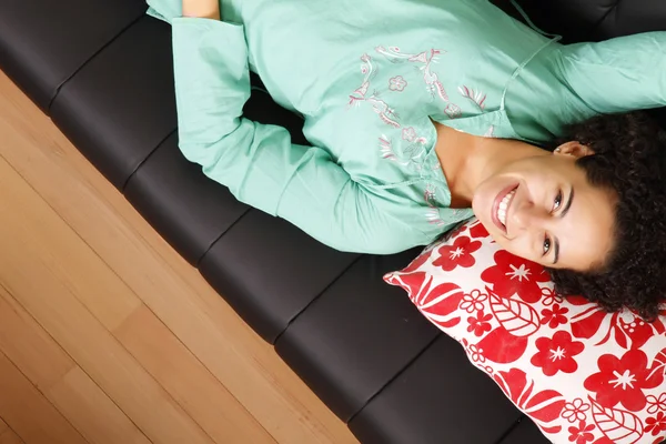 Relaxing on the sofa — Stock Photo, Image