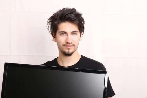 Man met een tv — Stockfoto