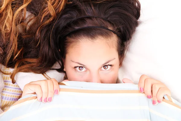 Hiding under a blanket — Stock Photo, Image