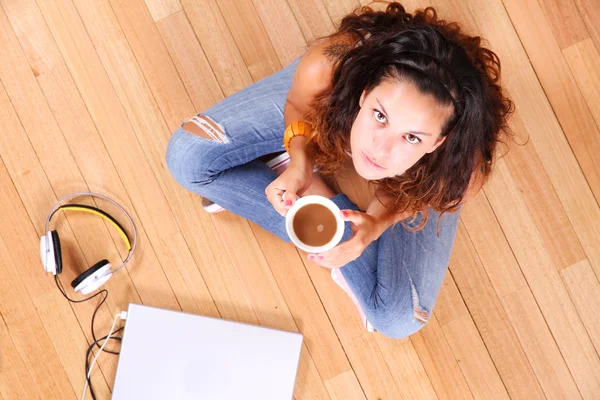 Sitting on the floor — Stock Photo, Image