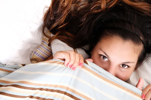 Hiding under a blanket — Stock Photo, Image