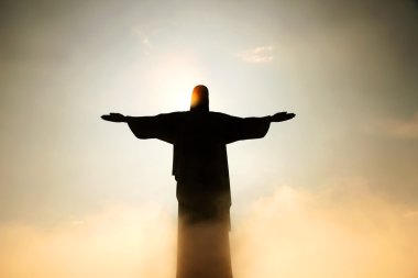 Cristo Redentor behind clouds clipart