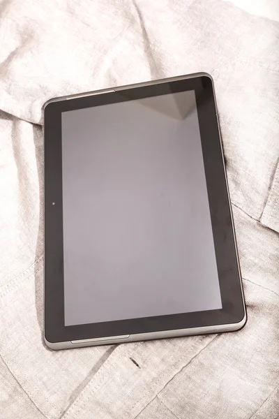 Tablet PC on Cloth — Stock Photo, Image