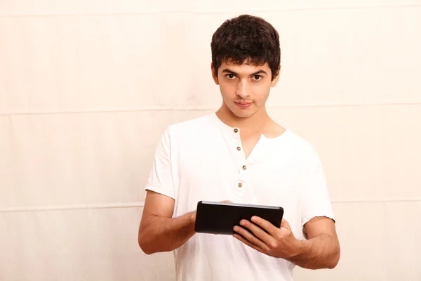 Young man with aTablet PC — Stock Photo, Image