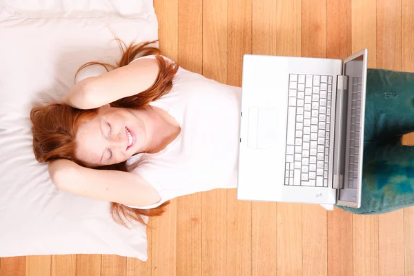 Young Redhead Girl with a Laptop — Stock Photo, Image