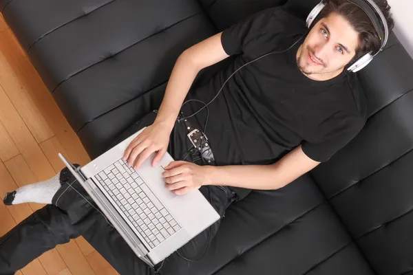 On the Sofa with a Laptop — Stock Photo, Image