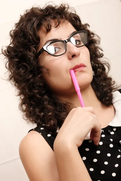 Pensive with a Pen — Stock Photo, Image