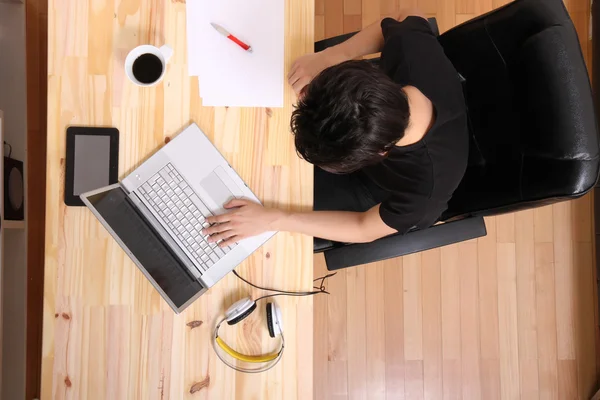 Working on a wooden Desk — Stock Photo, Image