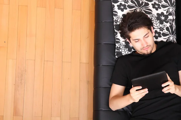 Young man with aTablet PC — Stock Photo, Image