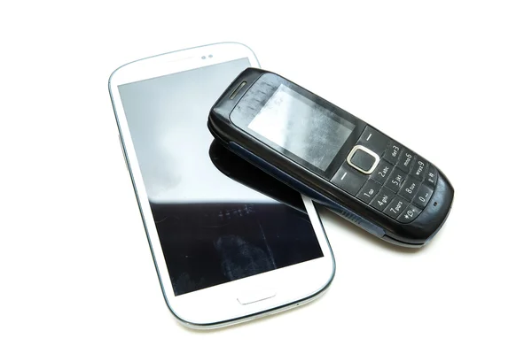 Telefones celulares antigos e novos — Fotografia de Stock