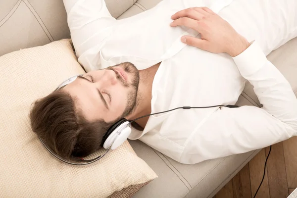 Listening music on the Sofa — Stock Photo, Image