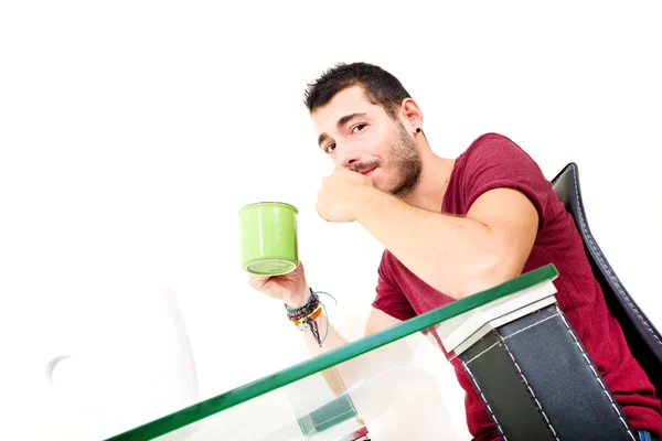 Young male thinking in the office — Stock Photo, Image