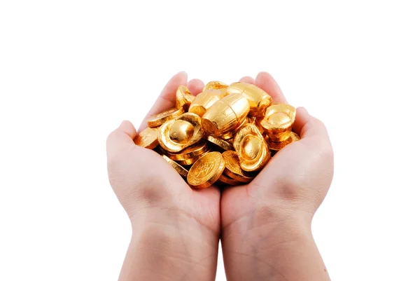 Both hands holding gold coins — Stock Photo, Image