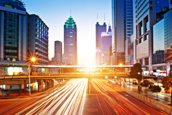 Moving car with blur light through city