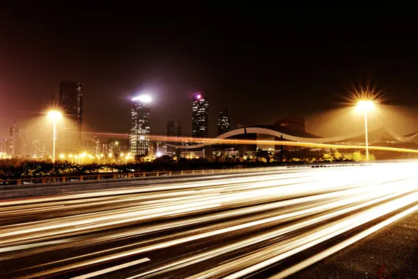 Fast moving cars — Stock Photo, Image